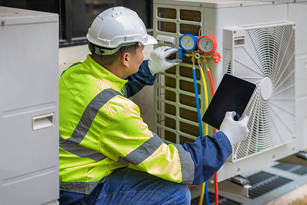 Professional Hvac Maintenance technician working in Garden City, NY